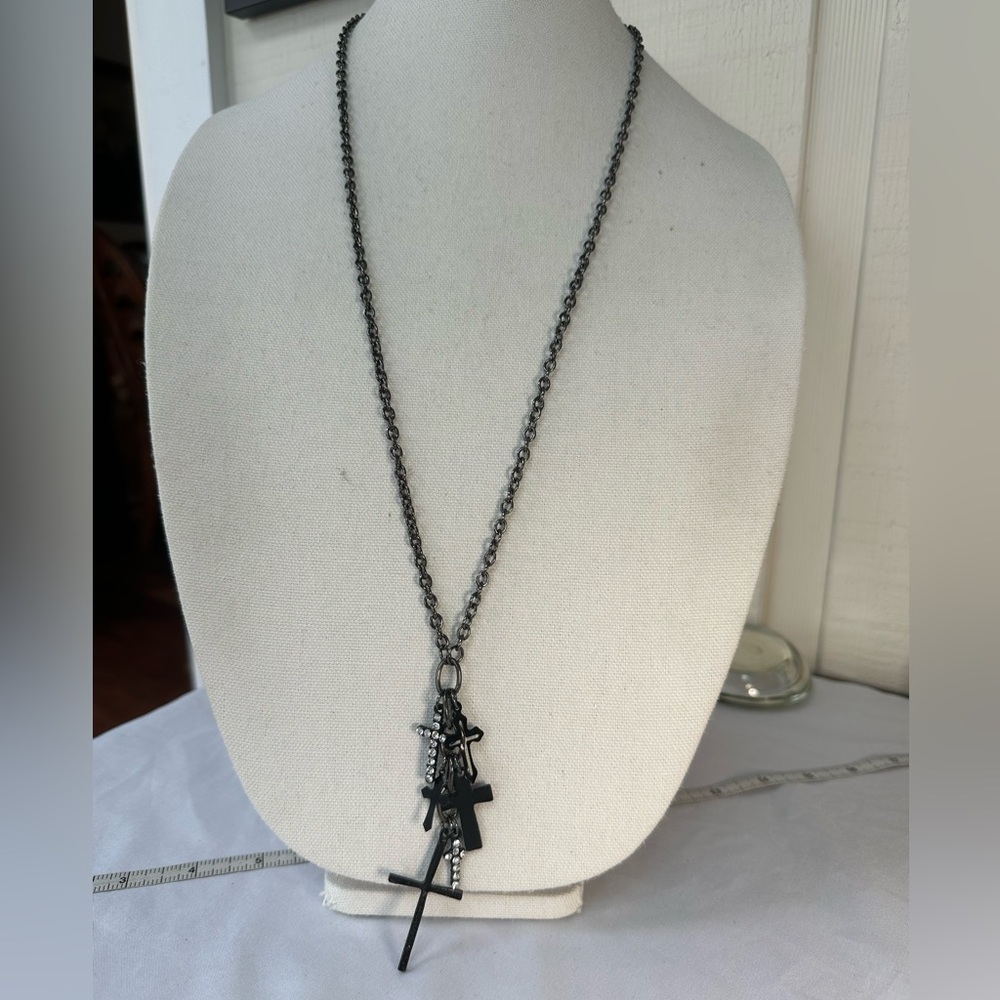 Long multi cross charm statement necklace